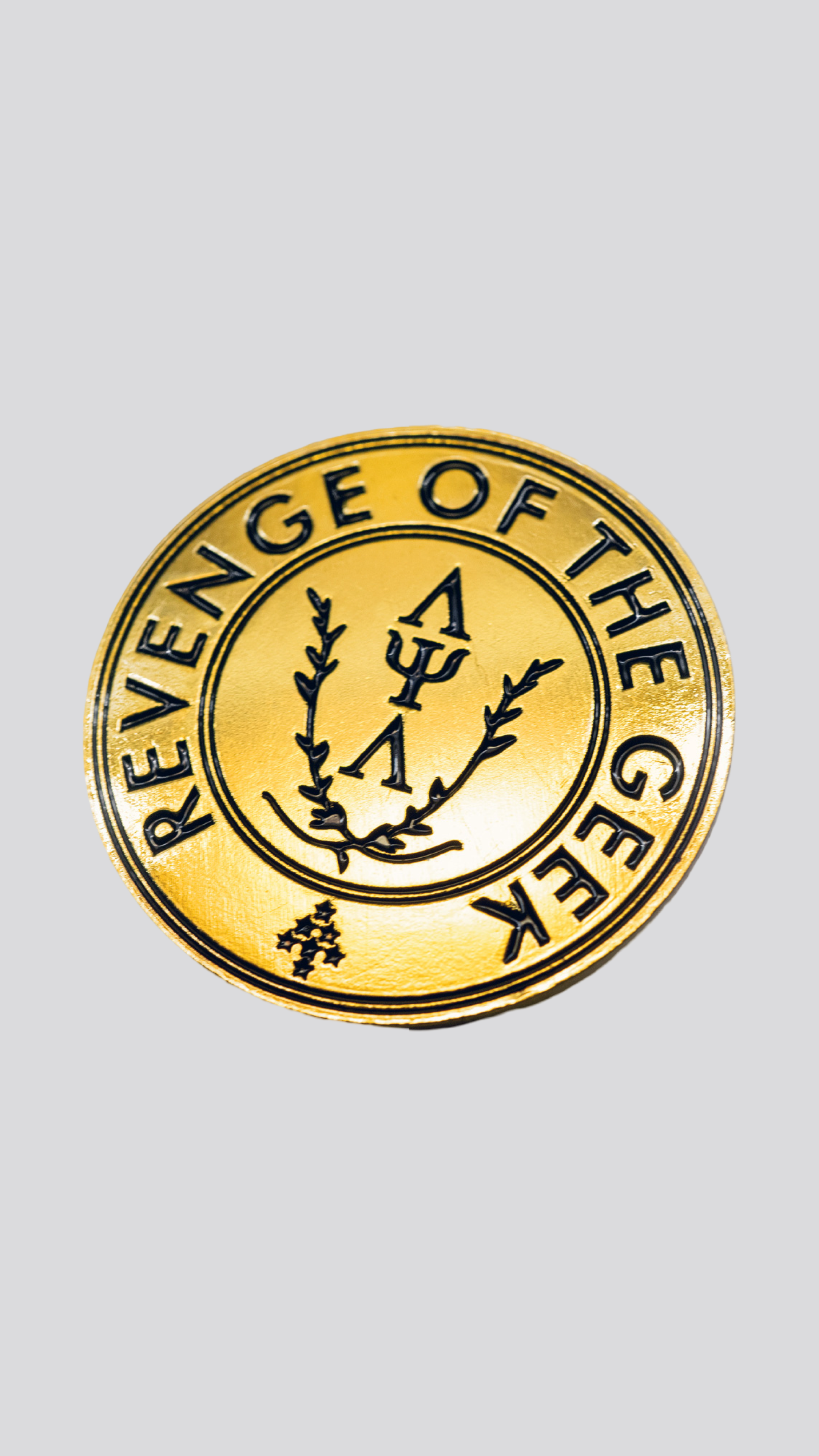 Crest Emblem Pin — Gold + Black
